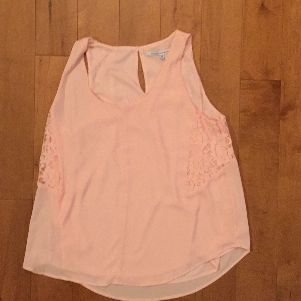 Blush colored tank top.